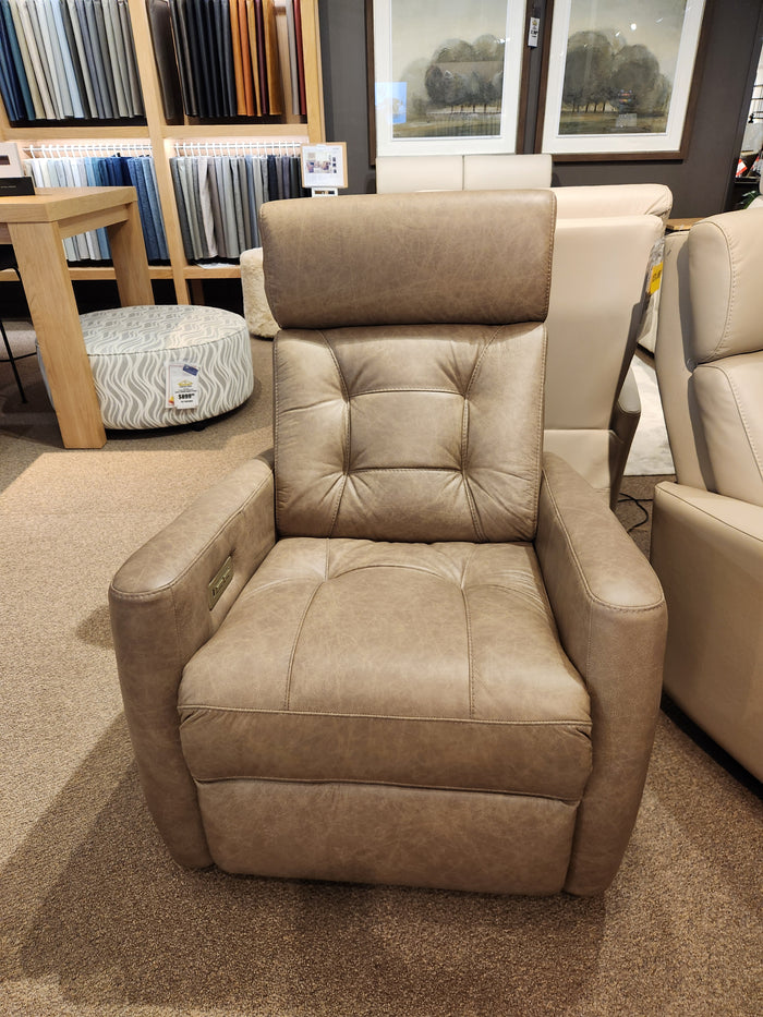 Palliser 43411 Baltic 2 Power Swivel Glider with tan leather and button-tufted backrest on display in showroom.