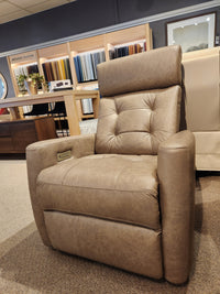 Palliser 43411 Baltic 2 Power Swivel Glider Recliner with power headrest, shown in showroom with fabric samples behind.