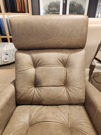 Palliser 43411 Baltic 2 Power Swivel Glider in brown leather with visible stitching and button tufting.