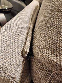 Close-up of a Donald Choi Laguna Sofa cushion with high-density foam seat and black zipper between cushions.