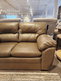 Palliser 77343 Amisk Loveseat in brown leather with high-resiliency foam seat, shown with plush cushions.