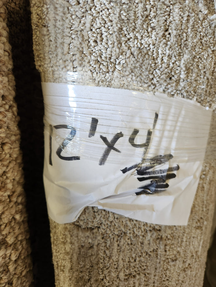 A Flooring CLEARANCE Carpet Remnant 12' x 4', low pile beige, labeled "12' x 4'", like a grey area rug.
