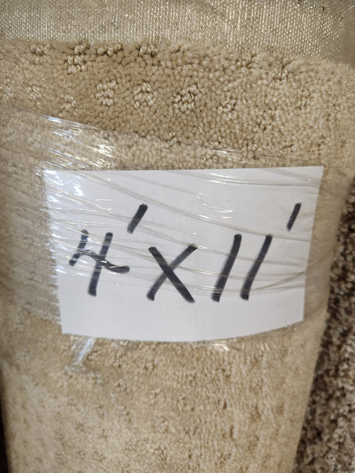 Flooring CLEARANCE Carpet Remnant 4' X 11', beige low pile, rolled and wrapped in plastic.