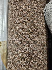 A close-up of Flooring CLEARANCE Carpet Remnant 11'3" X 8'6" medium pile on a metallic surface.