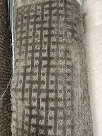 A close-up of Flooring CLEARANCE Carpet Remnant 11'6" x 7'6" with a geometric square pattern, in-store display.