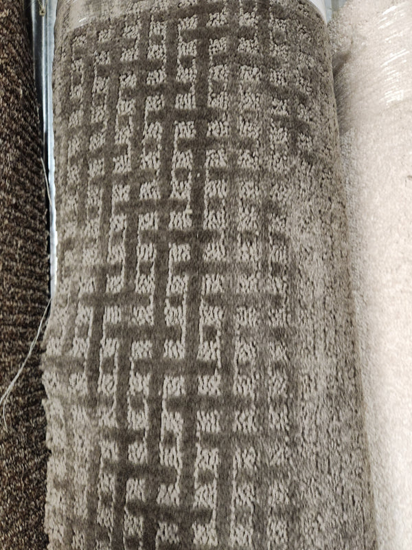 A close-up of Flooring CLEARANCE Carpet Remnant 11'6" x 7'6" with a geometric square pattern, in-store display.