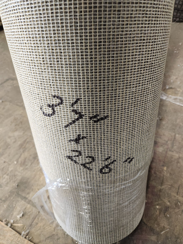 A Flooring CLEARANCE Carpet Remnant 3'7" X 22'6" rests on a dark grey surface, featuring handwritten numbers.