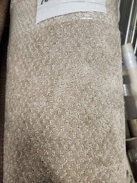 Close-up of Flooring CLEARANCE Carpet Remnant 12' X 6'10" in beige with a subtle dotted geometric pattern and price label.