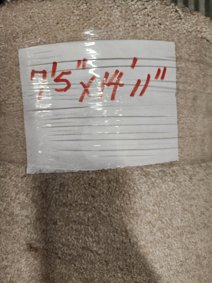 A Flooring CLEARANCE label on Carpet Remnant 7'5" X 14'11" shows the size handwritten in red marker.