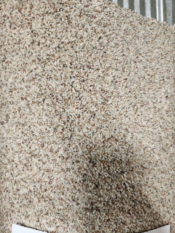 Close-up of Flooring CLEARANCE Carpet Remnant 12' X 7'3", showcasing its multi light brown, textured pattern.