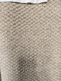 Close-up of Flooring CLEARANCE Carpet Remnant 5'8" X 6'5", beige with a hint of Medium Plie grey at the top edge.