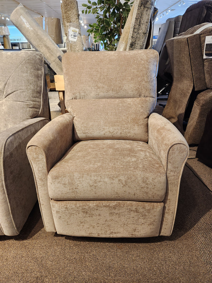 The Palliser Pinecrest Rocker Recliner features a beige upholstered finish with rolled arms and a supportive high back.