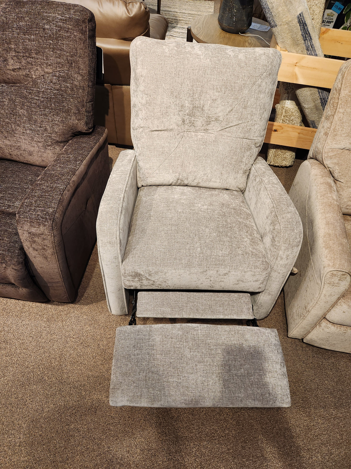 The Palliser 40033 Theo Swivel Glider Recliner offers a light gray, compact design with an extended footrest for any room.