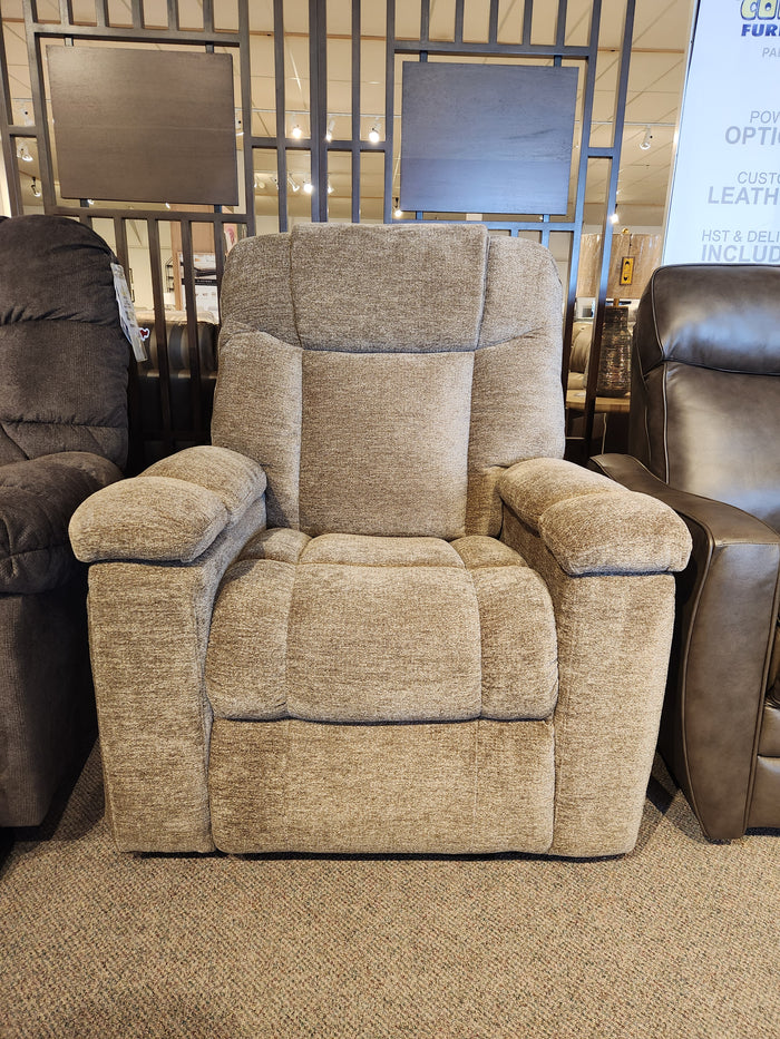 A Golden Venice PL447 Power Lift Chair on display among similar chairs in a furniture store.