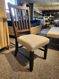 The Willow Creek 5 Piece Dining Table Set by Jofran features beige-upholstered chairs for rustic dining style.
