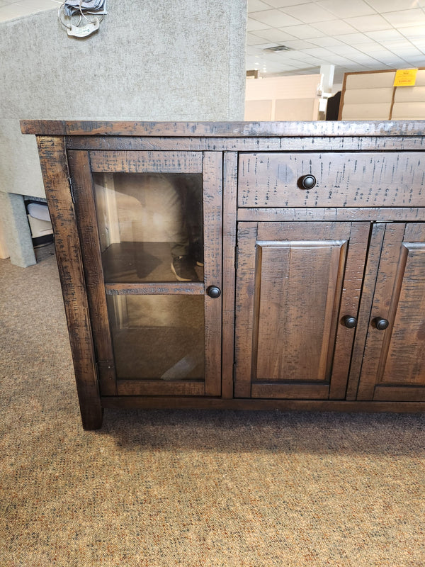 The Jofran Willow Creek Server features glass and solid doors, one drawer, and adjustable shelves.