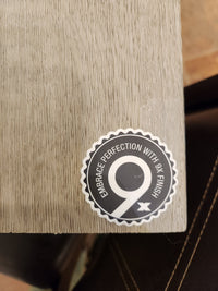 A sticker on wood reads "Embrace Perfection with 9x Finish"—perfect for Beckham Brothers Posh Plank LVP Middlesex.