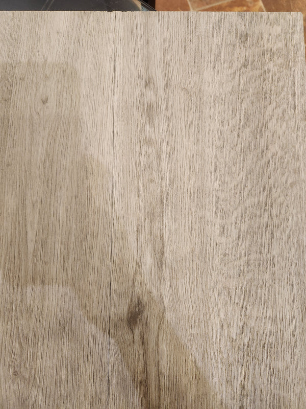 Close-up of light wood tabletop with grain, resembling Beckham Brothers Posh Plank LVP - Middlesex.