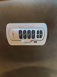 Close-up of La-Z-Boy 804 Belmont Power Wall-A-Way Recliner With Heat Tilt control panel, buttons, and USB port on brown upholstery.