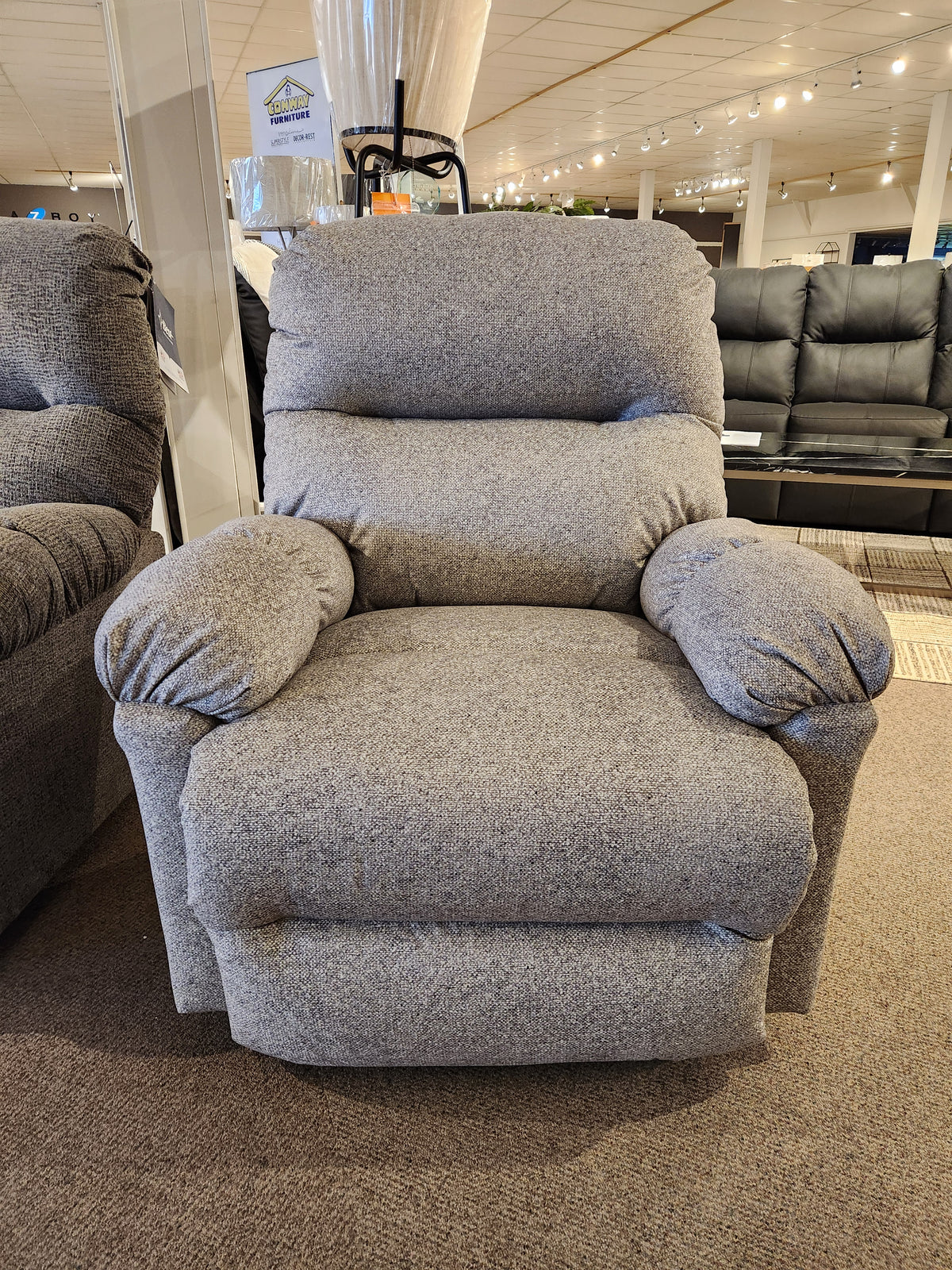 The Best 7MP84 Ellisport Power Space Saver Recliner offers comfort and efficiency in the showroom among seating options.