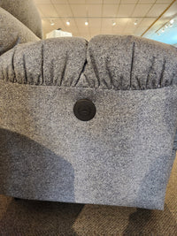 Close-up of Best 7MP84 Ellisport Power Space Saver Recliner armrest with circular button control panel.