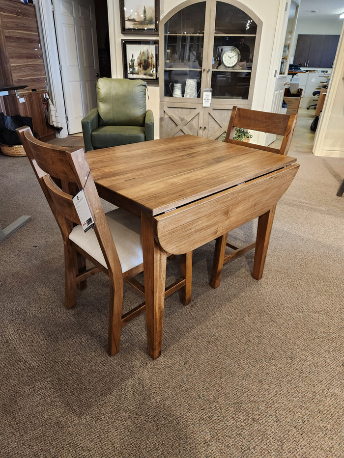 The Handstone 3 Piece Parker Dining Table Set includes a drop-leaf table and two chairs, ideal for small spaces.