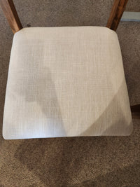 The Handstone 3 Piece Parker Dining Table Set is ideal for small spaces and looks great on a brown carpeted floor.