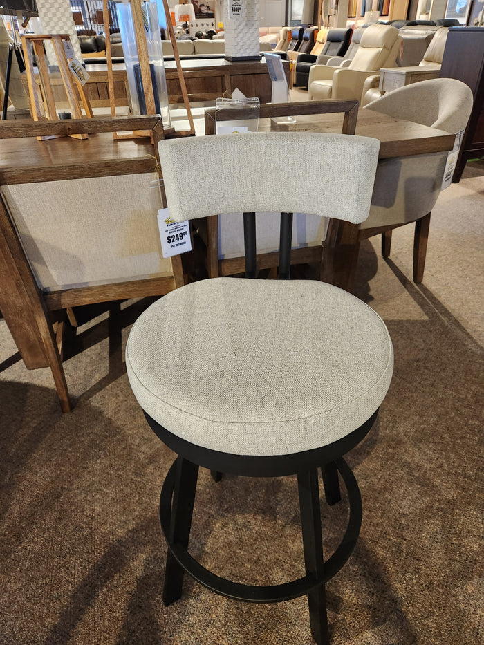 The Amisco Barry Swivel Bar Stool in light gray with a black steel base and scratch-resistant finish is on display.