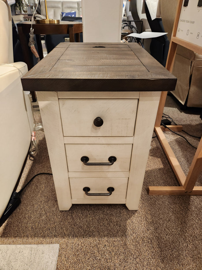 The Jofran 1706 Madison County Power Chairside End Table has a dark top and three drawers, shown on carpet.