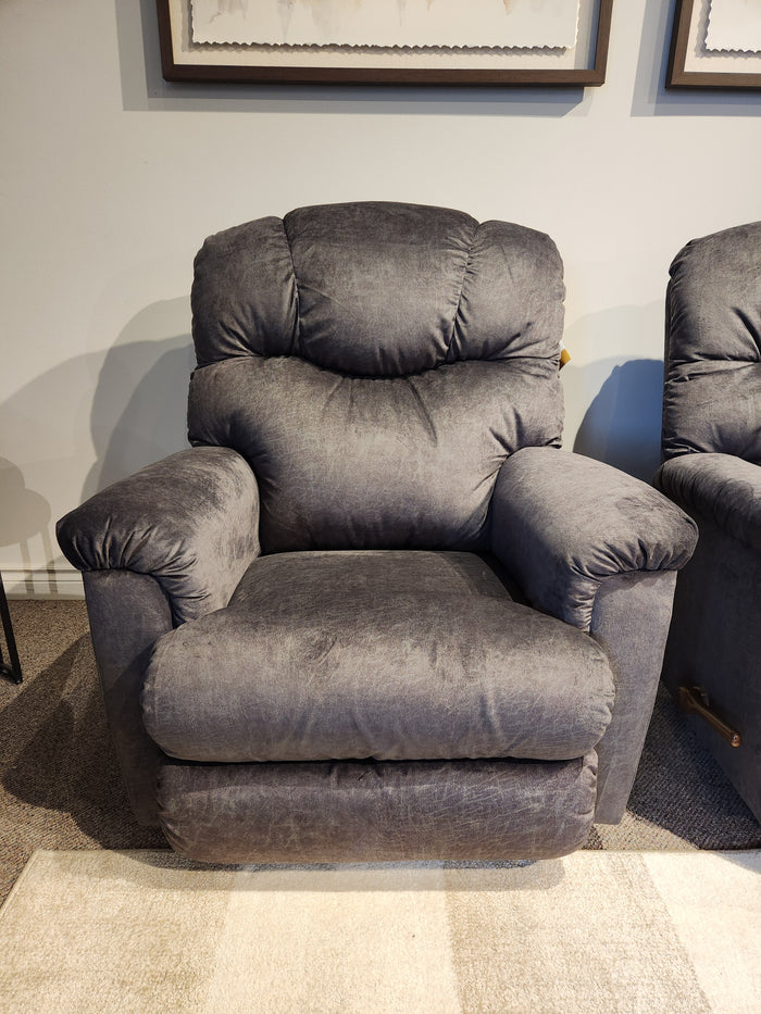 A La-z-boy 515 Lancer Wall-A-Way Recliner in gray rests on a beige carpet by a light-colored wall.