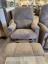A gray La-z-boy 795 Mercury Rocker Recliner with an extended footrest is displayed in a furniture showroom.