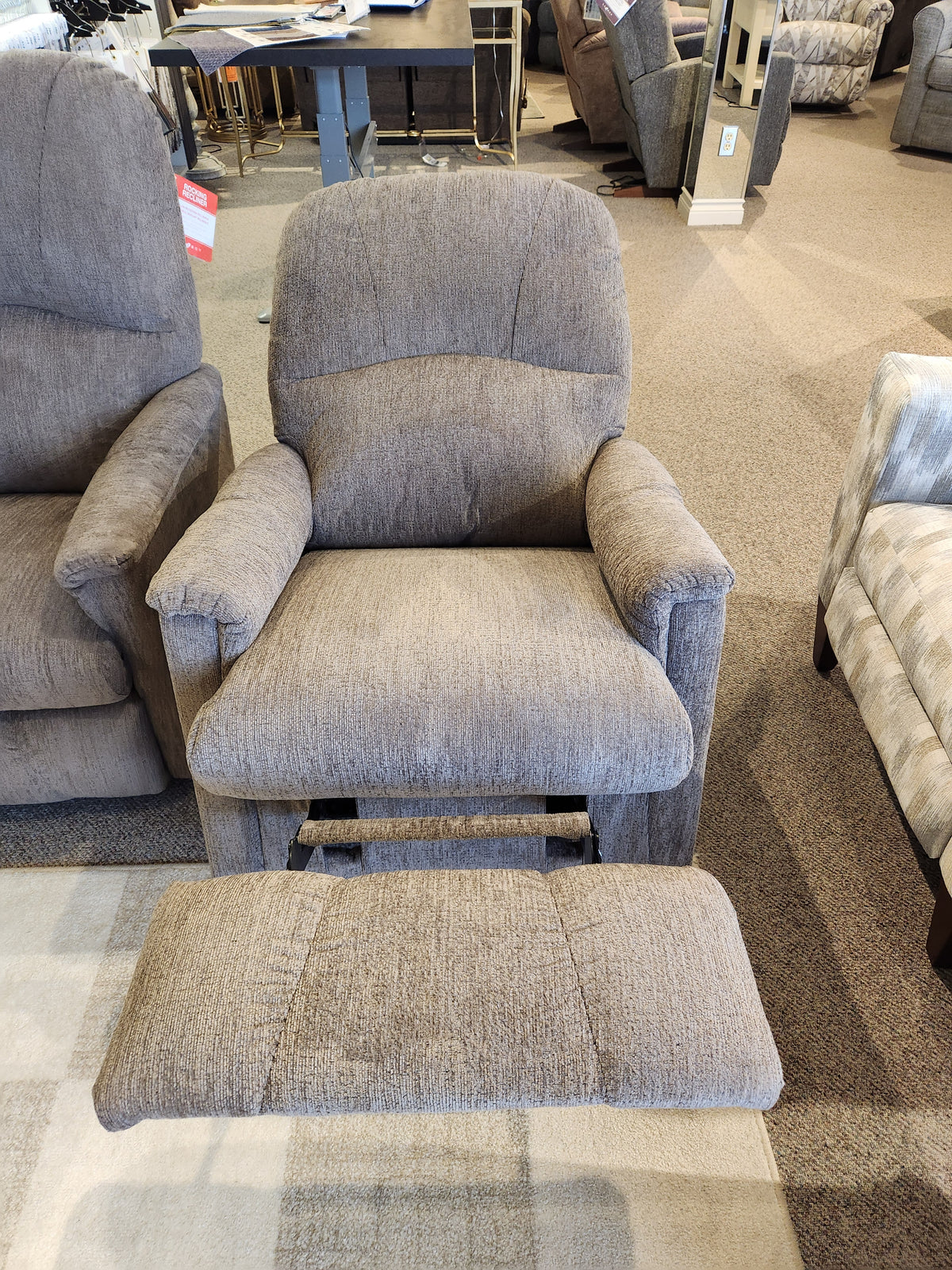 La-z-boy 795 Mercury Wall-A-Way Recliner in gray upholstery with extended footrest shown among similar showroom chairs.