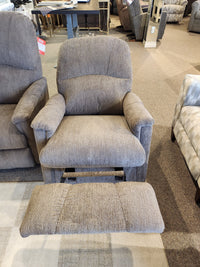 La-z-boy 795 Mercury Wall-A-Way Recliner in gray upholstery with extended footrest shown among similar showroom chairs.