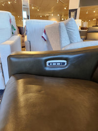 Close-up of La-Z-Boy 810 Quinault Power Reclining Chair armrest with electronic controls in a showroom.