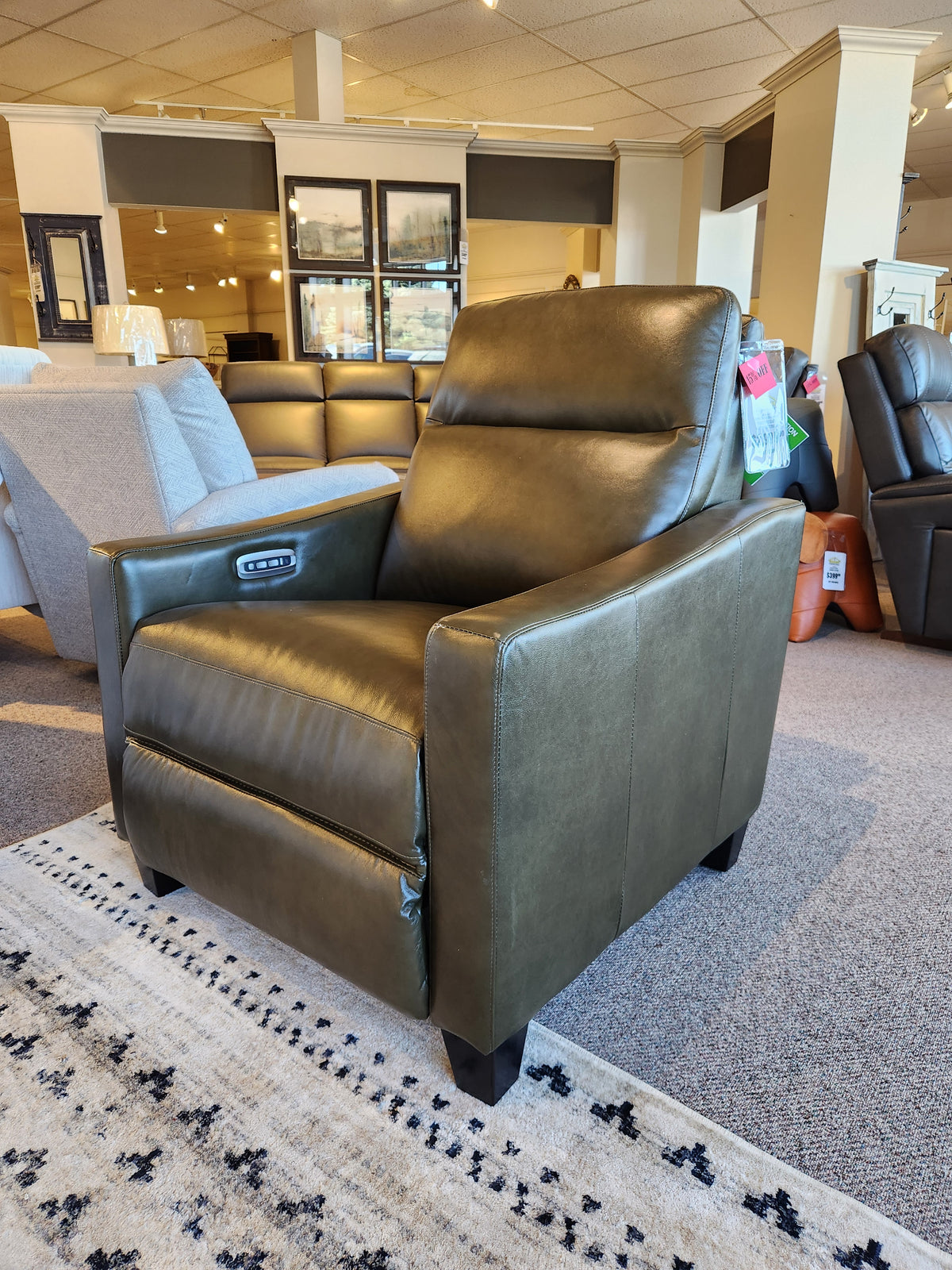 La-Z-Boy 810 Quinault Power Reclining Chair w/ Zero G & Headrest in dark green, on display atop a patterned rug.