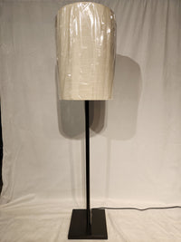 The Adesso Lamp Liam Floor Lamp features a dark bronze finish, square base, and cylindrical fabric shade.