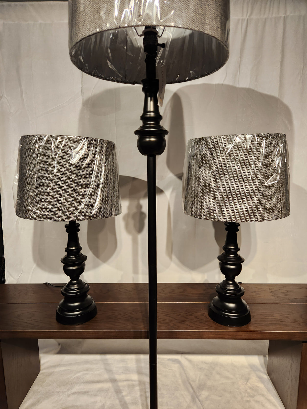 Adesso Lamp Chandler 3 Piece Set: two table lamps and one floor lamp, all with gray fabric shades.