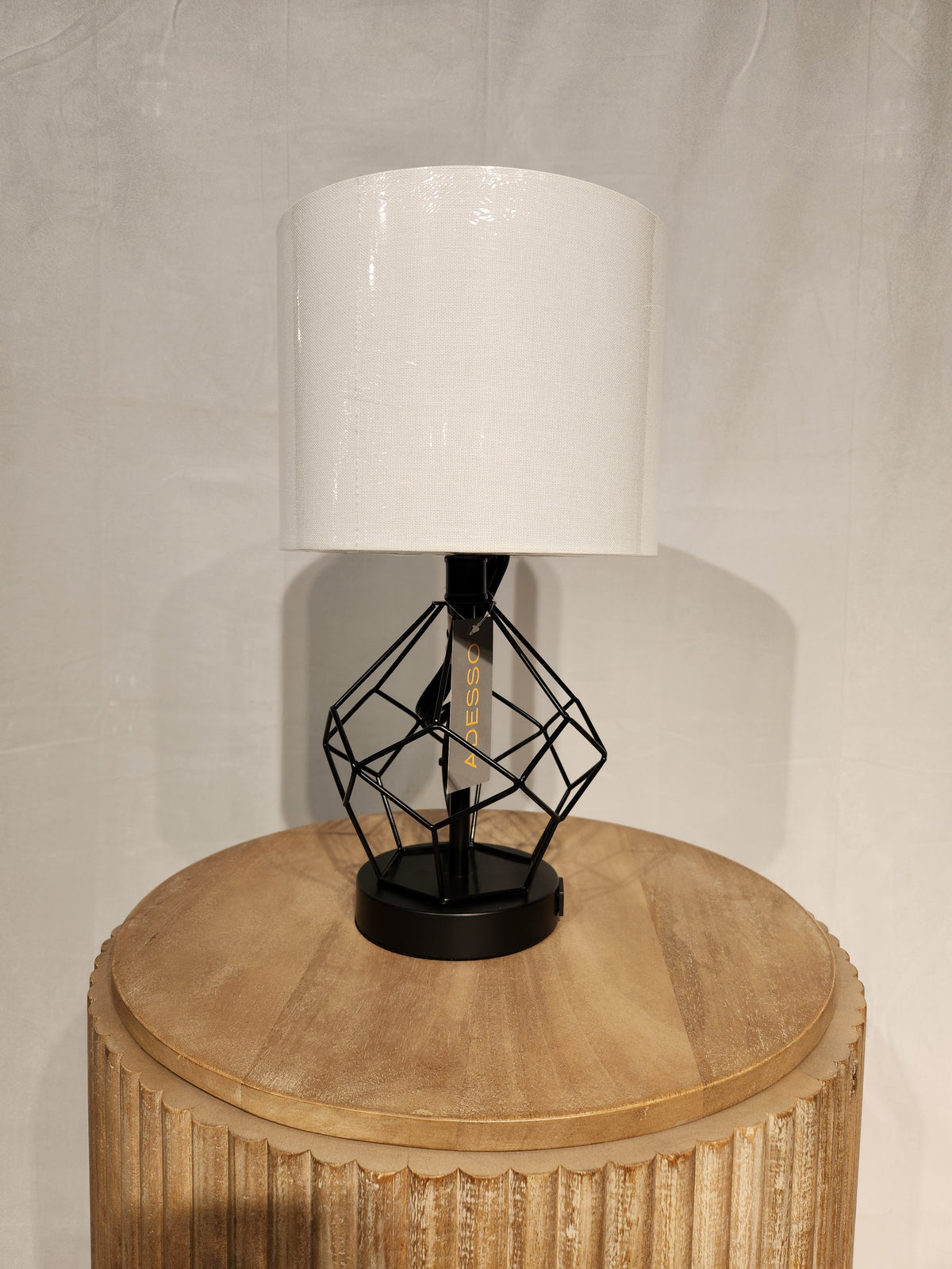 The Adesso Lamp Chiara 2 Piece Set features a black metal base and white shade, ideal for modern table lamp lovers.