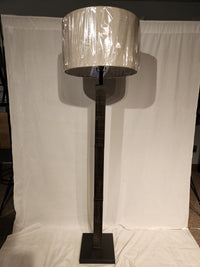 The Adesso Lamp Kona Floor Lamp features a square base, cylindrical shade, and farmhouse-style reclaimed wood finish.