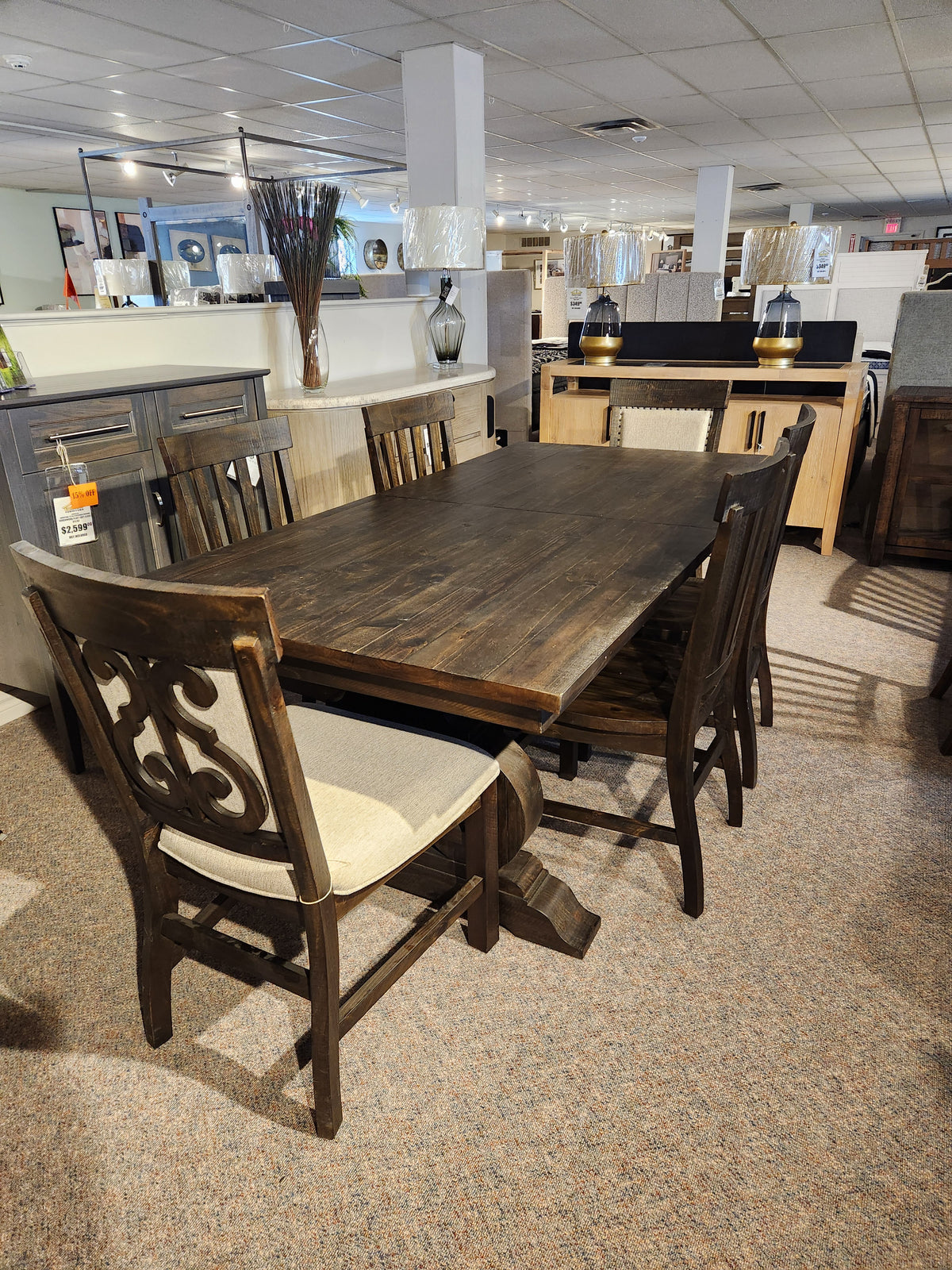 Magnussen 2491 Bellamy Dining Package with 6 chairs, displayed in a stylish home setting.