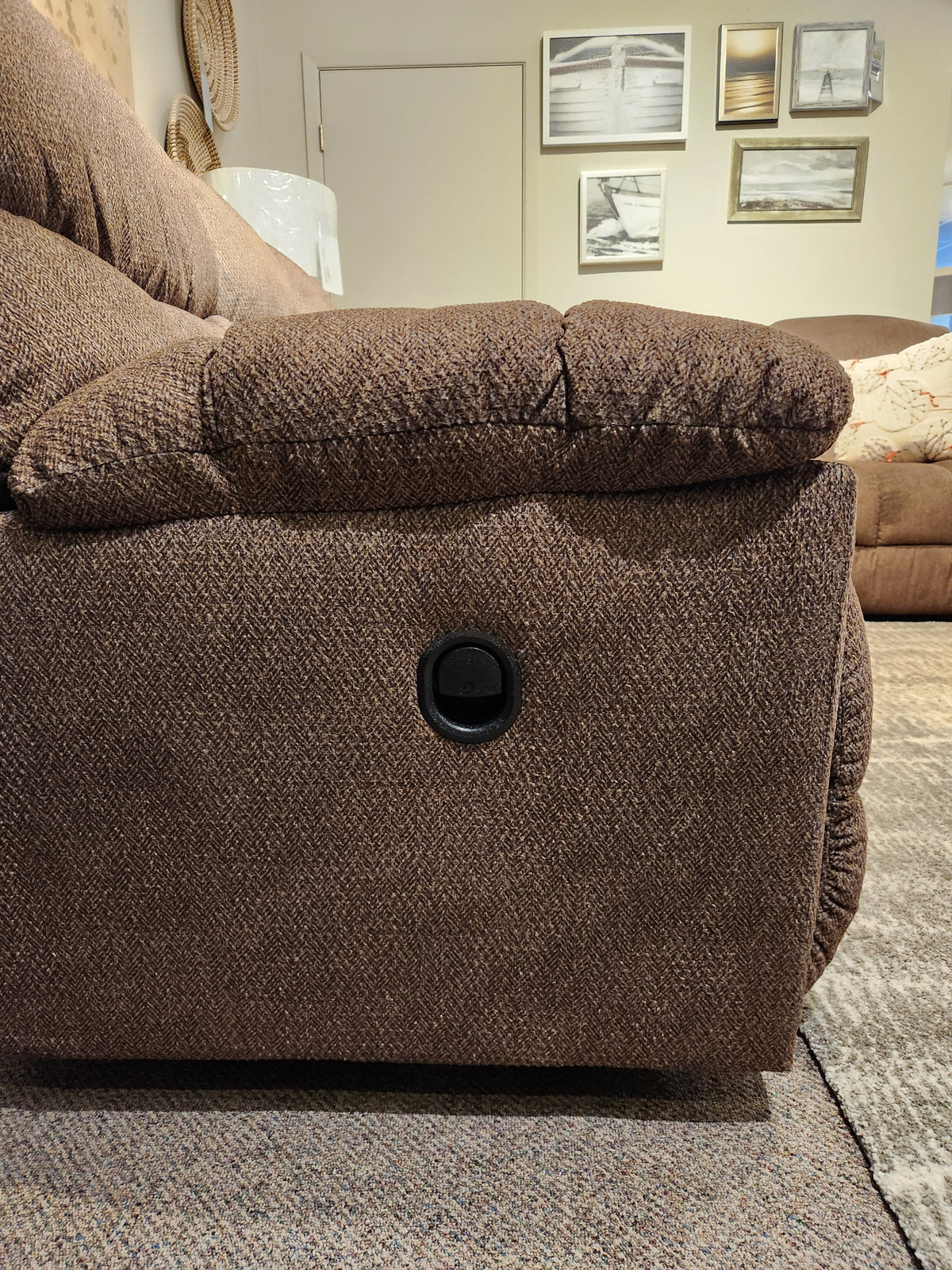 Close-up side view of the La-Z-Boy 766 Morrison Reclining Sofa with plush channel tufting in a cozy living room.