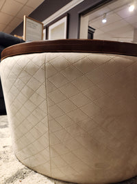 The Decor-rest 6415 Lift Top Storage Ottoman/Coffee Table features quilted beige fabric and wooden trim for a chic look.