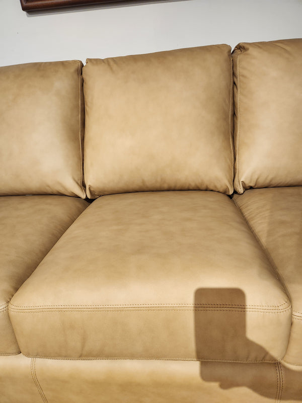 Decor-rest 3968 Sofa in tan leather features deep seats, three back cushions, and seat cushion shadow.