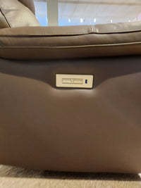 Close-up of the control panel with USB port on the arm of the Palliser 41051 Henry Sofa’s power headrest recliner.