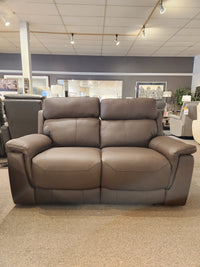 Palliser 41051 Henry Loveseat in brown leather with power headrest shown in a brightly lit showroom.