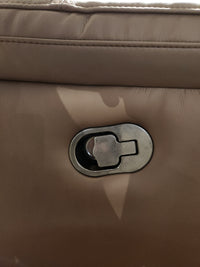 Close-up of a metal latch on the Palliser 41051 Henry Sofa in light brown leather upholstery.