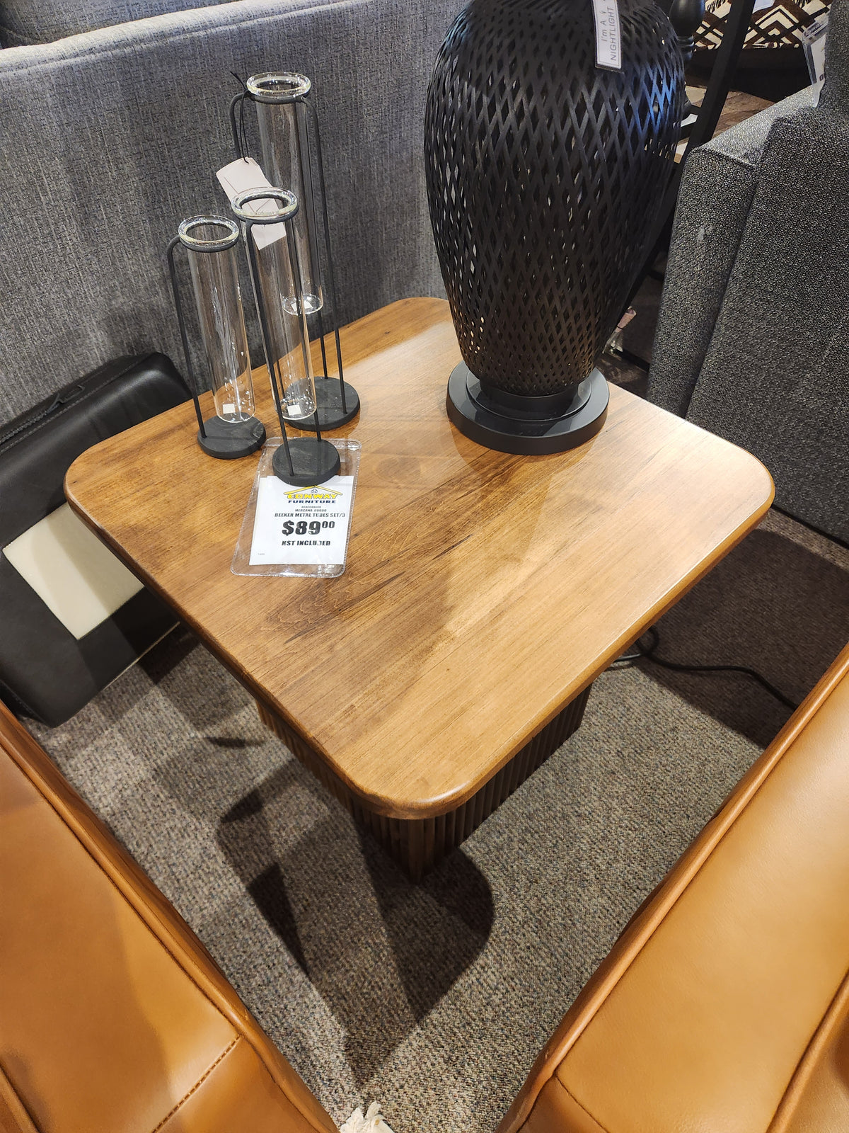 Handstone Lotus End Table: square wood design, elegant style, with black lamp and three glass vases.