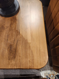 Handstone Lotus End Table: rectangular wood design with elegant styling and rounded corners—Lotus collection.