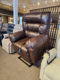 The Best 1B52 Troubadour heavy duty brown lift chair recliner with remote is on display in the showroom.
