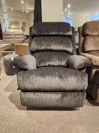 La-z-boy 519 Astor Rocker Recliner in gray with padded armrests and backrest on display in the showroom.